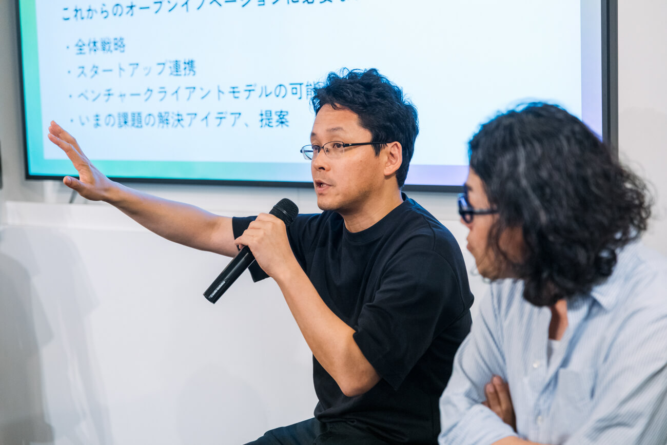 登壇者である株式会社ベンチャークライアントモデルの木村さんが話している様子の写真